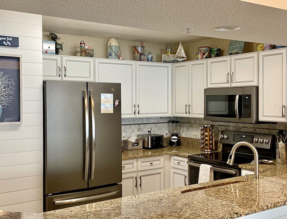 Coffee maker, toaster, blender, crock pot, mixer, electric fry pan. 
