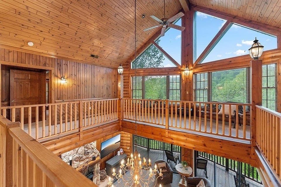 Upstairs open hallway with views and access to 4 of the bedrooms and a loft 