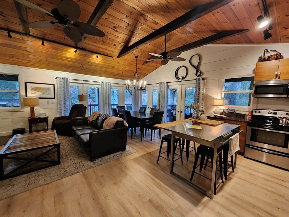 Wide angle view of the living area! All new flooring throughout the house.