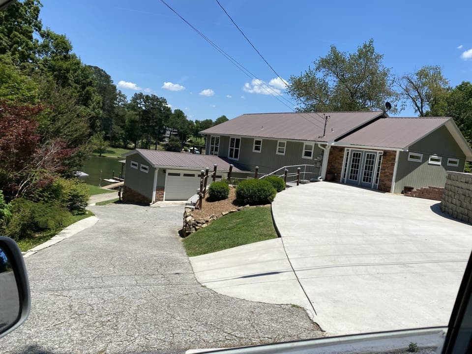 Plenty of parking on top or bottom driveway plus your own personal boat ramp 