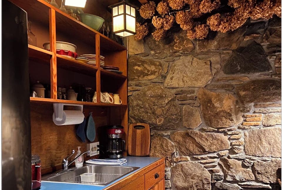 Kitchen with fridge in left foreground