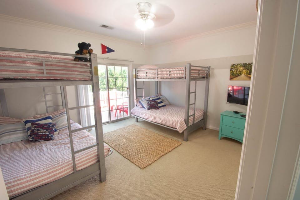 Bunk Room with TV. Two doubles on the bottom and singles on the top.  Sleeps 6. 