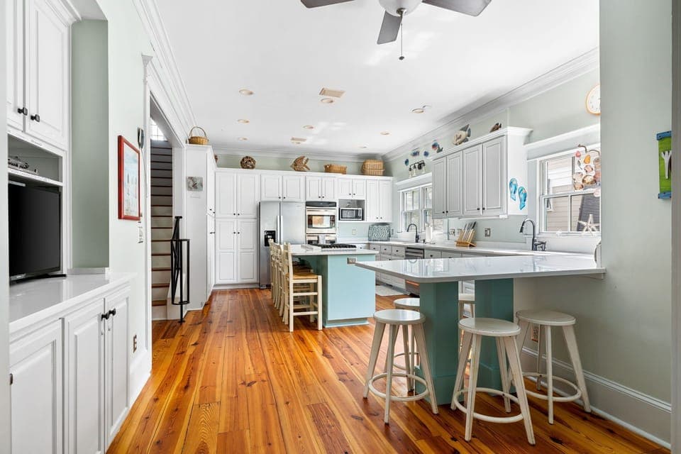 Kitchen fully stocked for all cooking and meal prep.  Seating for 9.