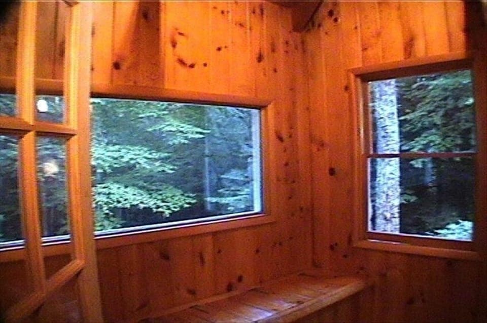 Front entrance porch with bench seating (partial view)