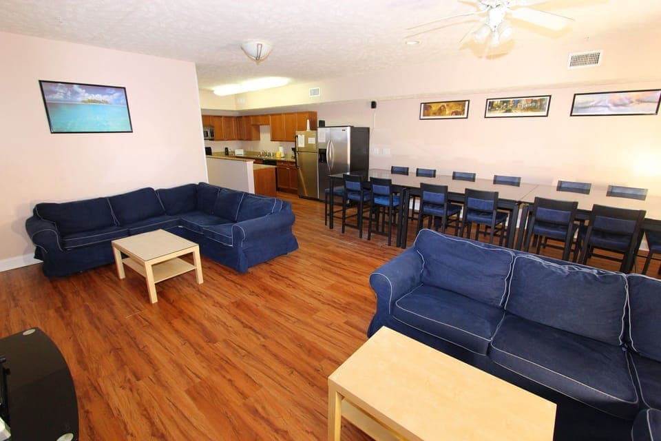 Flat-screen TV, video-game console, DVD player, foosball