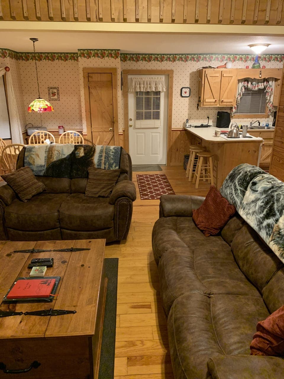 Living room facing kitchen and dining