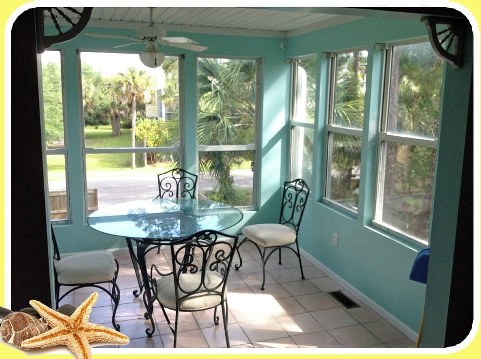 Main floor sun-room connected to the Kitchen