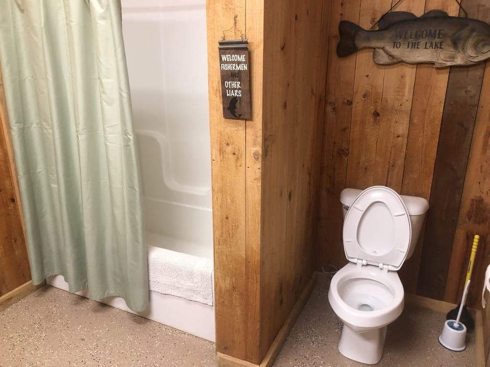 Toilet and Bathtub/Shower in the back building