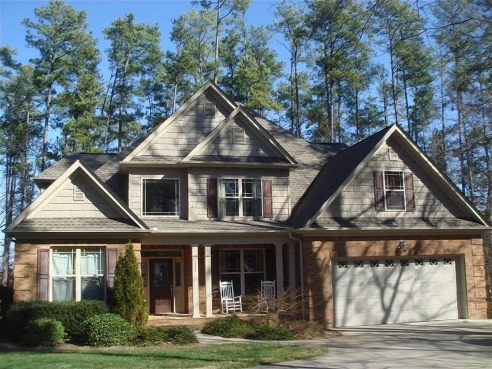Paved driveway and entry at a Clemson football rental with ample parking.