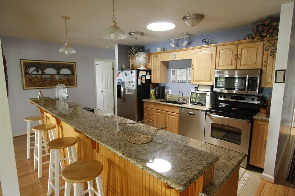 Kitchen - granite, stainless, cutlery,  dishes for twenty,all cooking utensils.