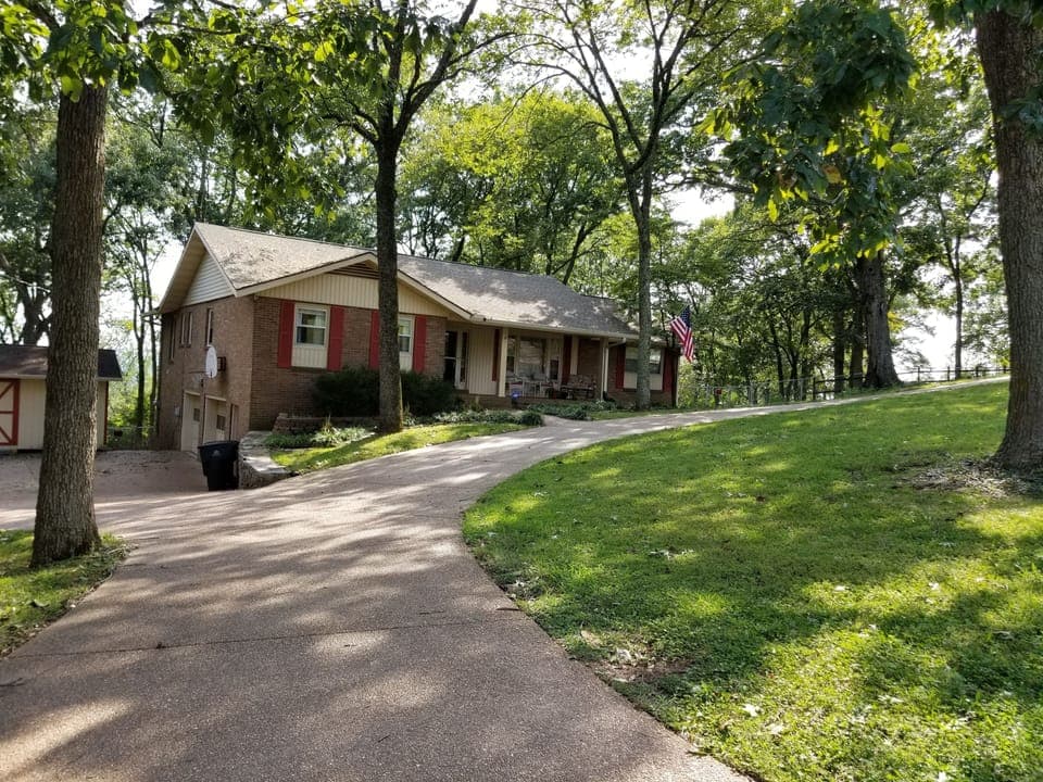 One acre yard on Paterson Knob. Apartment is on the lower level