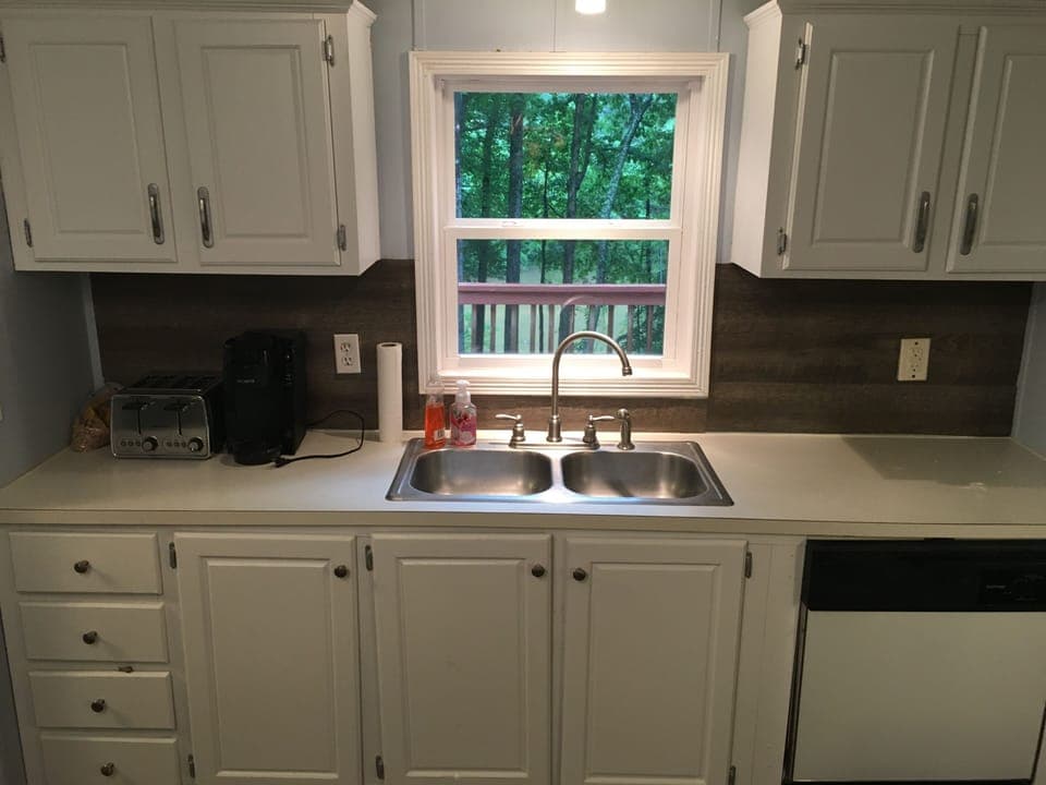Dishwasher, coffemaker (kcup)and microwave with lake view.