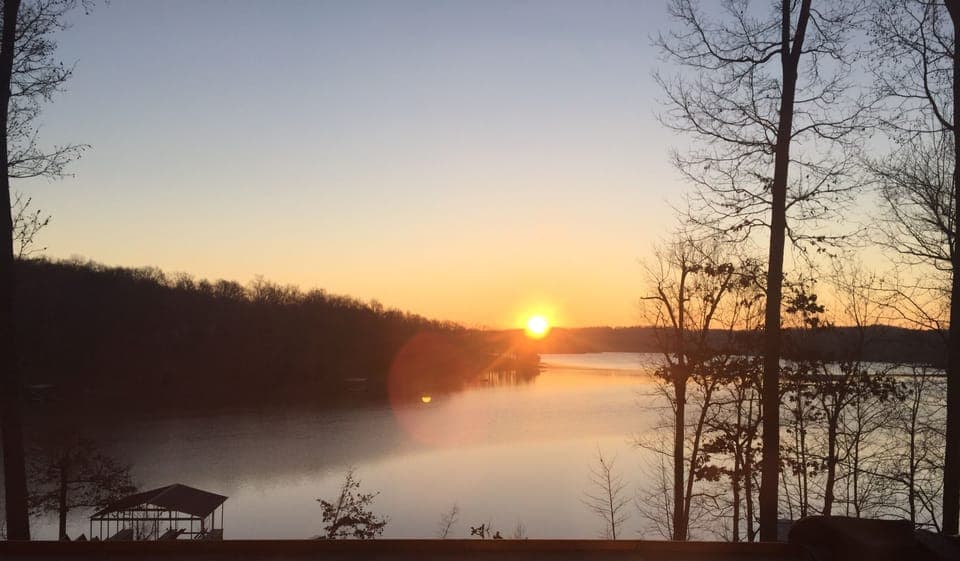 Sunrise view off upper deck. Enjoy your morning coffee! Best views on lake!