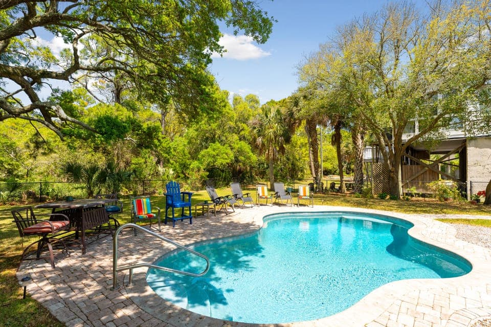 Plenty of sun and shade to enjoy pool side.