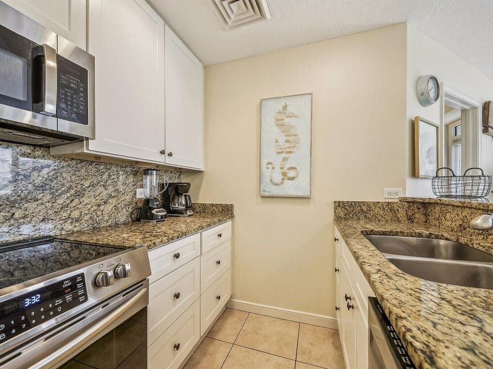 Kitchen with Stainless Steel Appliances at 2102 SeaCrest