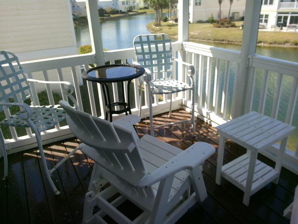 Upstairs Back Porch Screened
