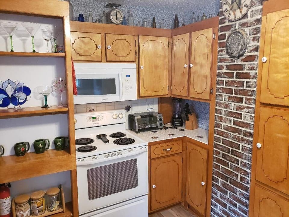Full size range / oven / microwave / toaster  / blender / coffee & ice machine