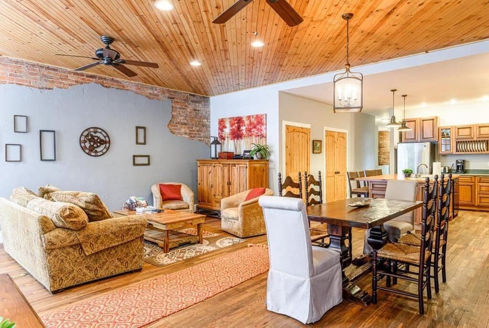 Attractive exposed brick and hardwood