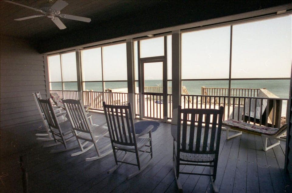 The screen porch is everyone's favorite place to relax, read, or just have fun!