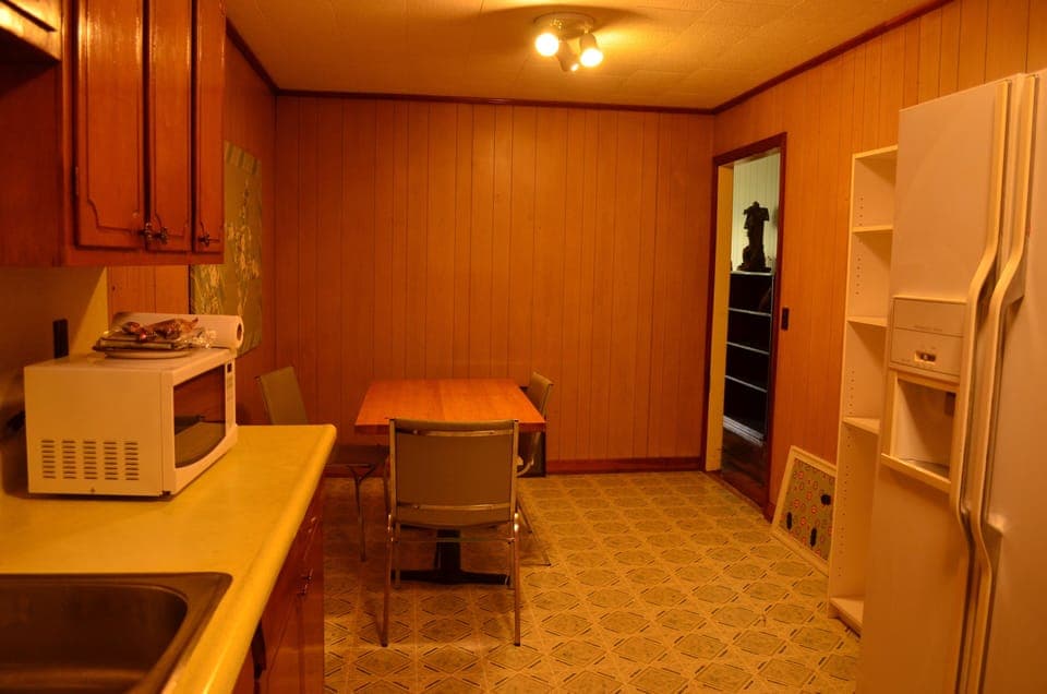 There are 3 seats in kitchen and four seats in living room.