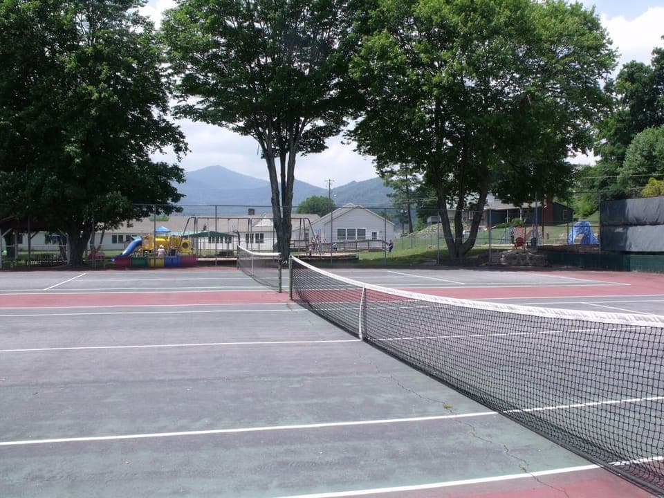 tennis courts and playground at the lake