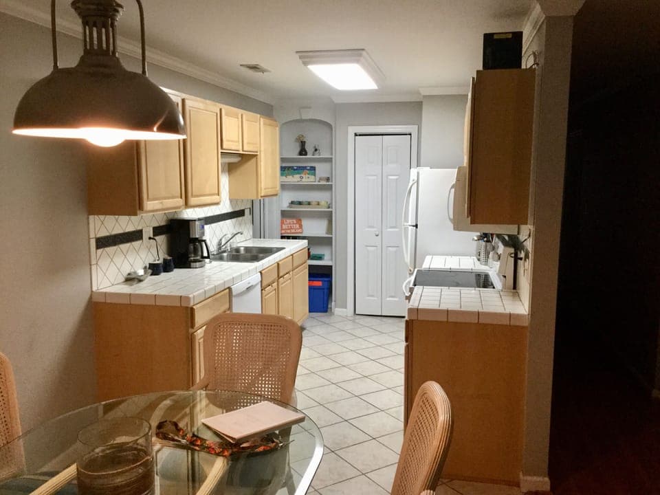 Kitchen with nice cookware and dinnerware...