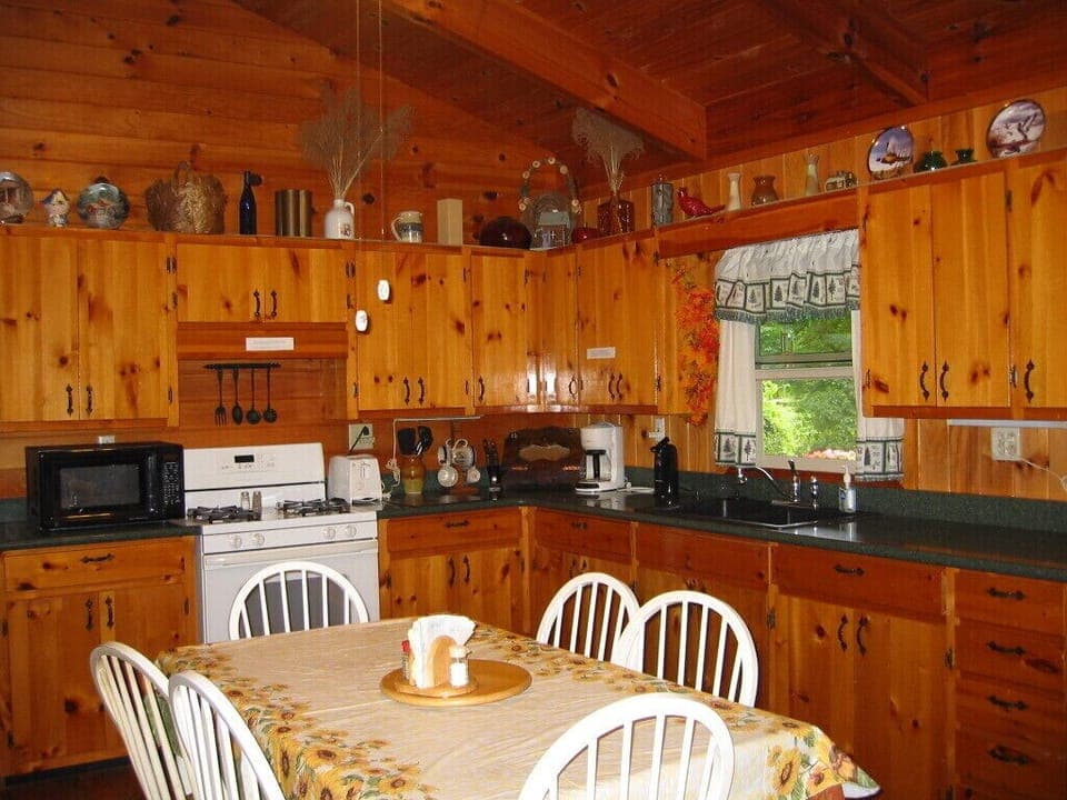 fully stocked kitchen--even spices. Full size refrigerator. 