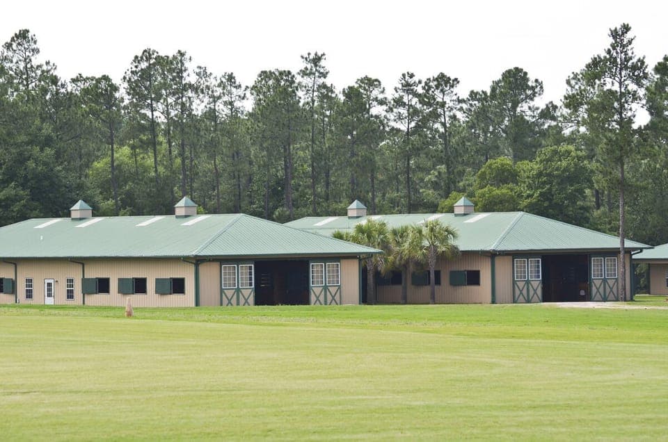 Two 12-stall barns with amenities for your equine partners
