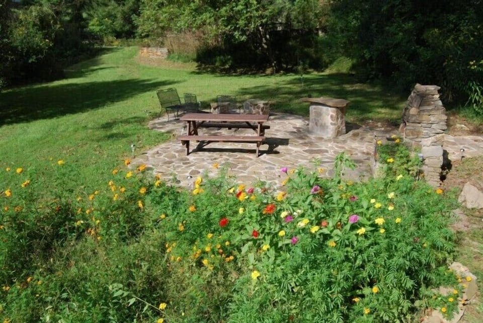 Fire Pit & BBQ Area, benches, PLUS 28 chairs to scatter in private areas on prop
