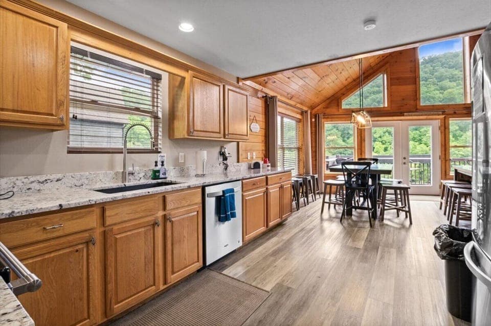 The kitchen has 2 refrigerators, fully stocked with large & small appliances.
