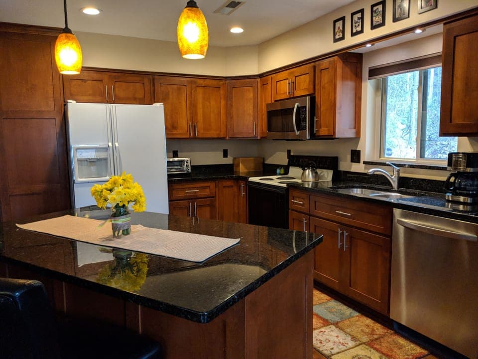 Refrigerator, toaster oven, microwave range, dishwasher, coffee maker