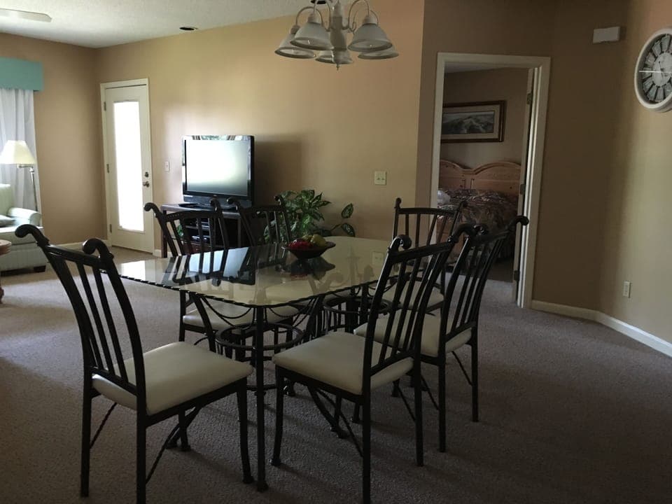 Dining table seats six, breakfast bar seats 3.
