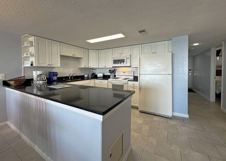Prep a meal in the fully equipped kitchen.
