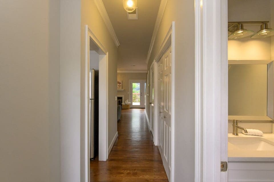 A view from the front door down past the first floor half bath