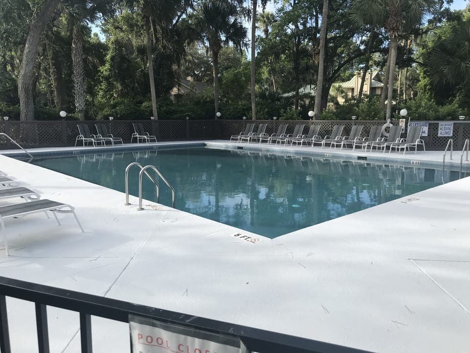 The larger pool, with new expanded deck area, redone in 2020