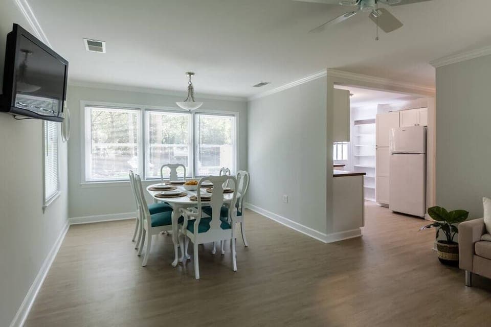 Dining area overlooking spacious back yard.