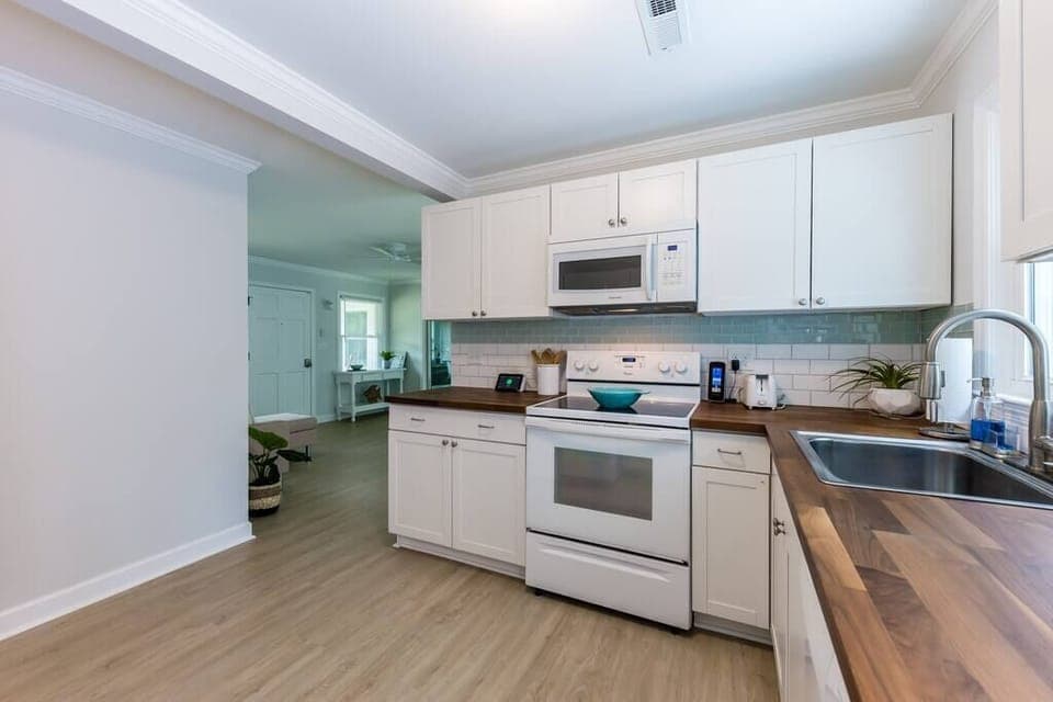 Spacious Kitchen opens to living room.