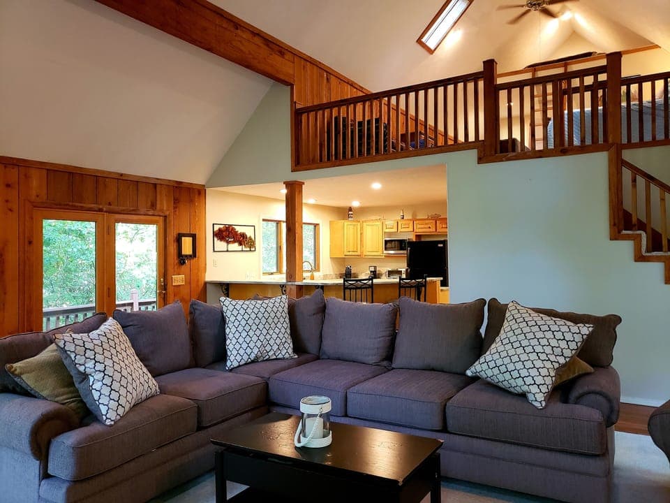Huge sectional in the den. Perfect for lounging, napping or movie watching.