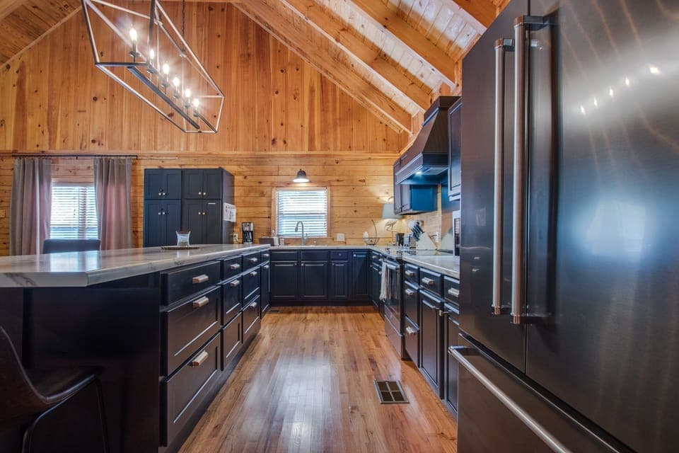 freshly remodeled kitchen, all new appliances,fully stocked, island seating for8
