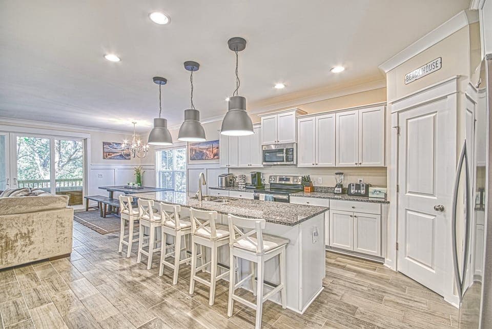 Fully Equipped Kitchen with all accessories and Island Seating for 5