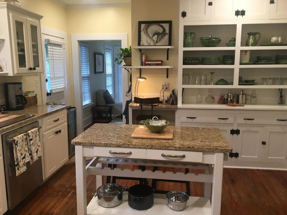 Updated kitchen with dining room and den access