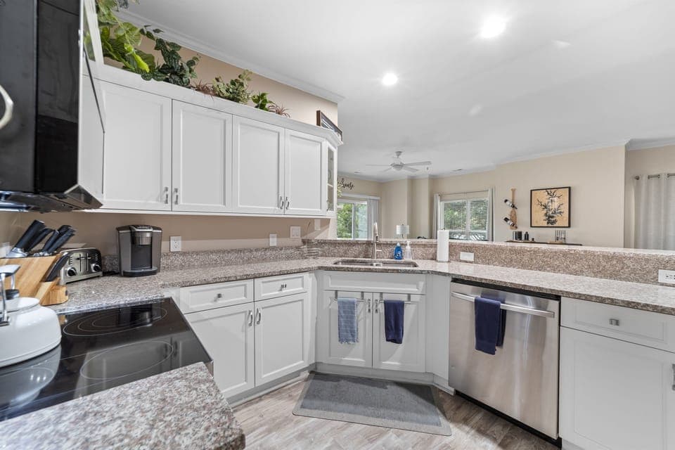 Fully equipped kitchen has everything you'll need for a short stay or a longer one.