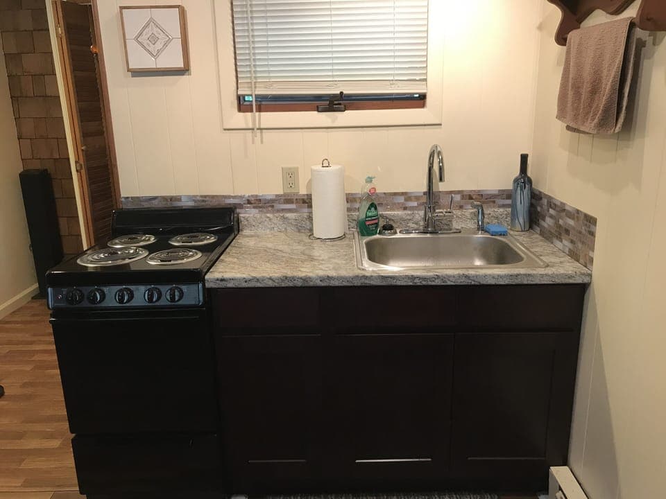 Kitchen area with stove/range 