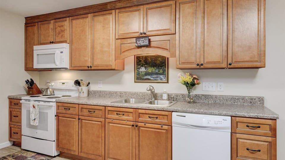 Kitchen includes dishwasher, stove- oven, microwave, full size refridgerator, keurig and drip coffee maker.