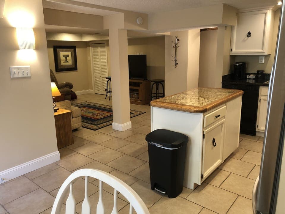 Kitchen, dining room and living room feature an open floor plan. 