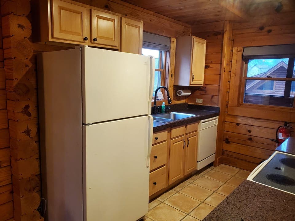 Kitchen view - leads to main cabin balcony and cabin hot tub