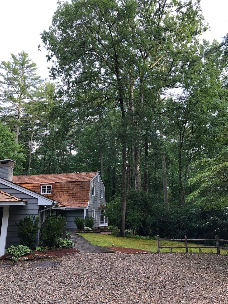 Beautiful cedar roofed Cape Cod Mountain Home nestled on five acres