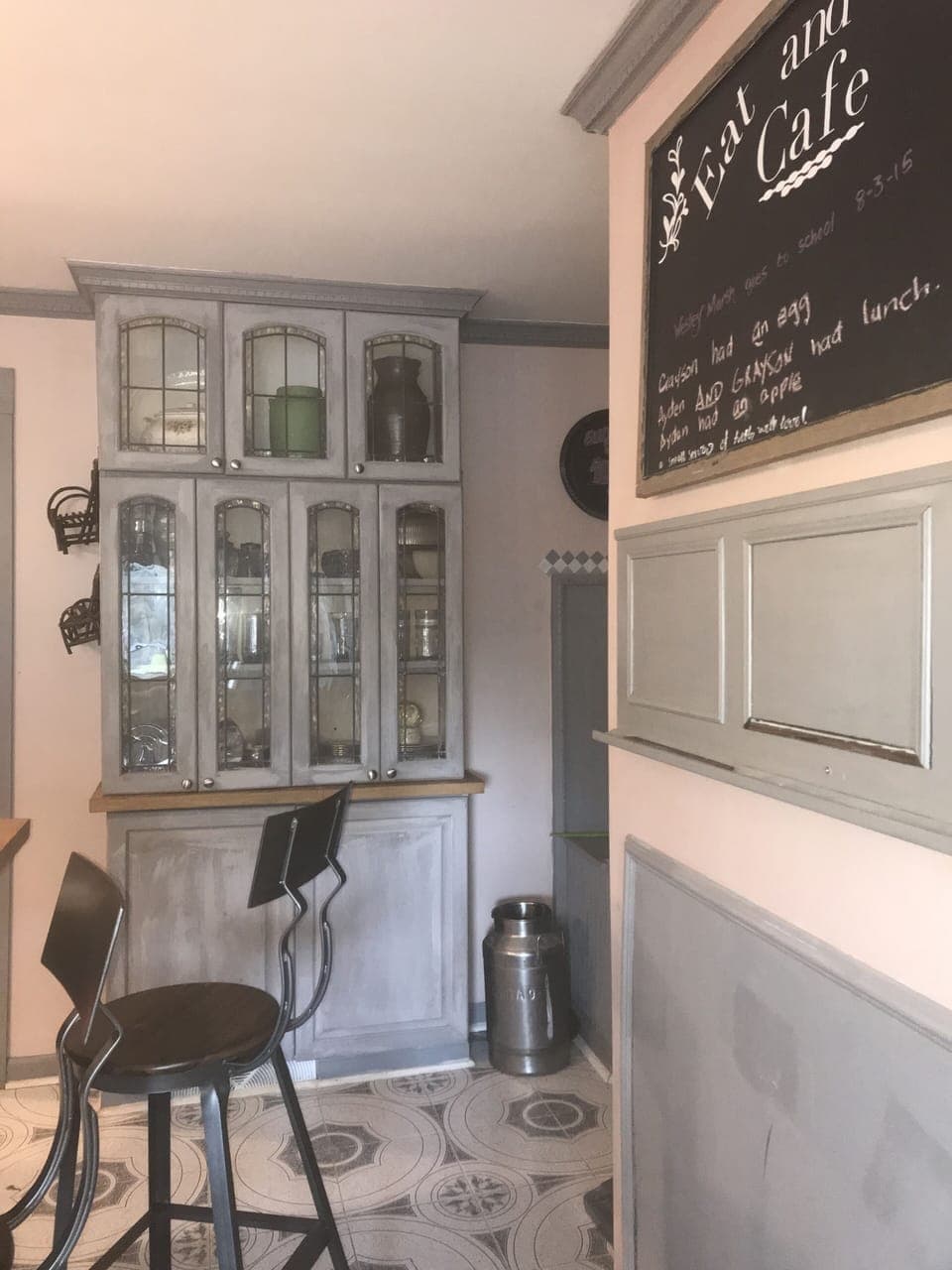 Kitchenette bar in corner of kitchen.