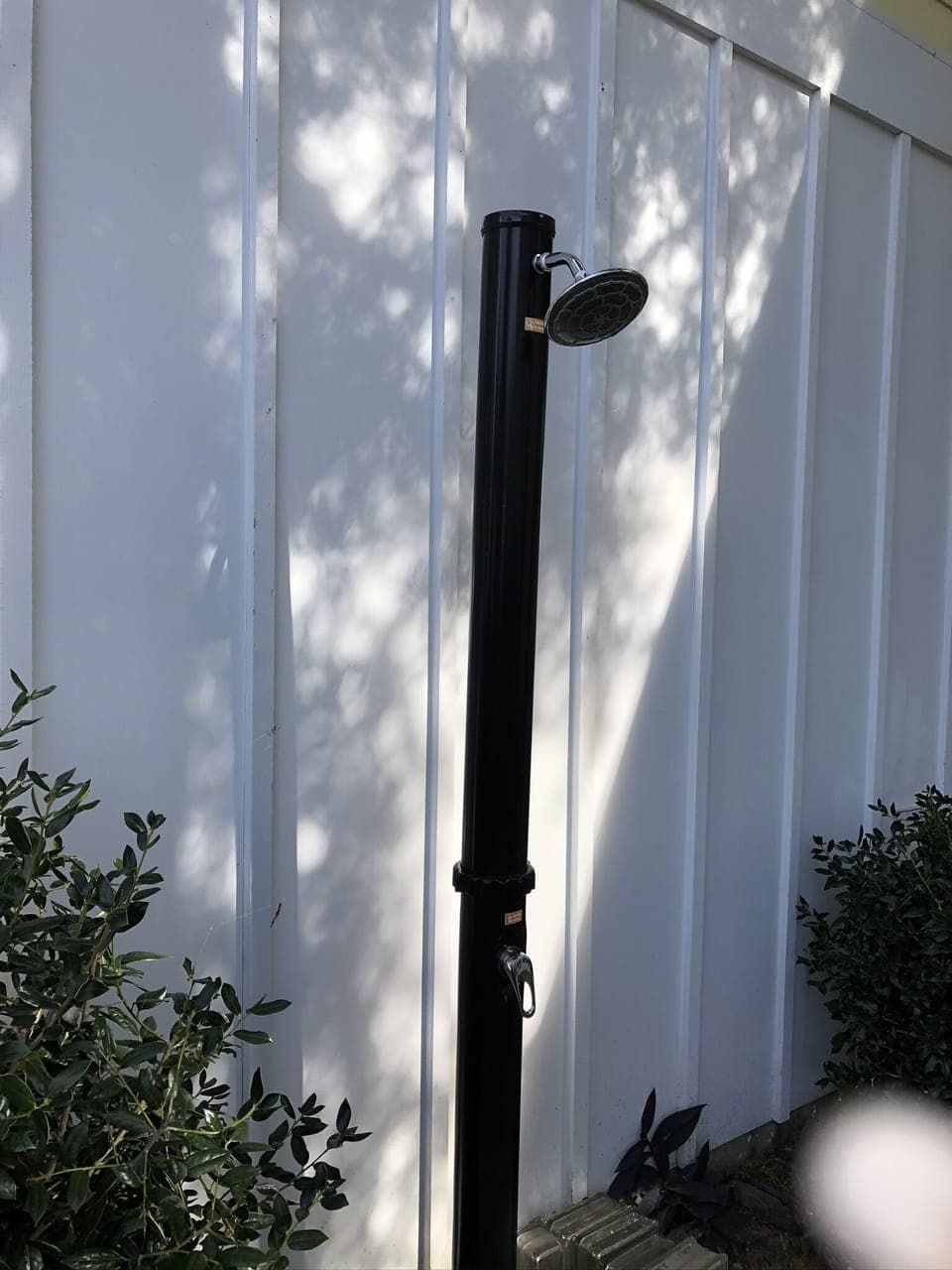Outdoor shower with hot and cold water for rinsing off the salt and sand 