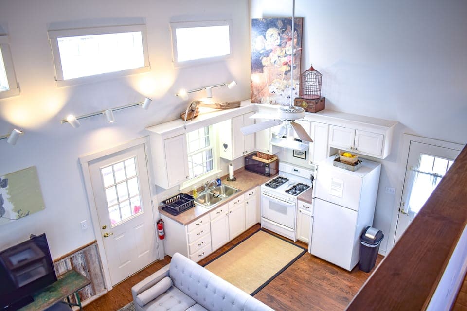 View of full kitchen from upstairs loft